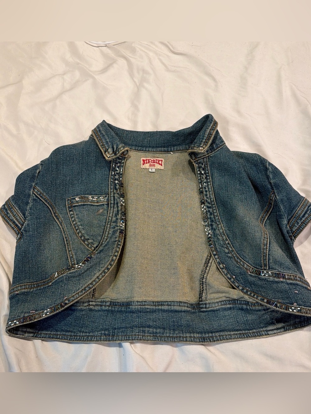 Nikibiki Women's Blue Cropped Denim Jacket with Sequin Trim - Picture 1 of 2